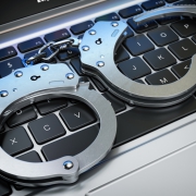 Image of cuffs in the laptop keyboard.
